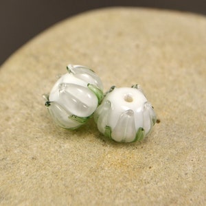 White blossom flower glass beads with green leaves, Artisan lampwork beads, White transparent floral beads