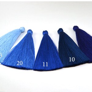 May include: Six different shades of blue tassel trim, ranging from light blue to dark blue. The tassels are labeled with numbers: 33, 20, 11, 10, and 29.