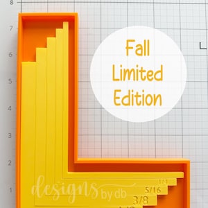 May include: An orange L-shaped frame containing nested yellow rectangular bars of varying heights. The bars are labeled with fractions 1/4, 5/16, 3/8, and 1/2. A white circular overlay features the orange text Fall Limited Edition.