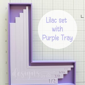 May include: A lilac-colored set with a purple tray. The set includes various rectangular pieces, with measurements labeled as 1/4, 5/16, 3/8, and 1/2. The text "Lilac set with Purple Tray" is displayed in a white circle.