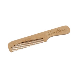 May include: A wooden comb with a handle that says "Lenie Salon".