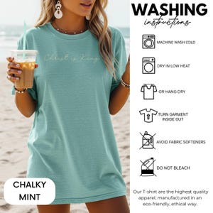 A woman wearing a green t-shirt with the text "Chalky Mint" printed on it, holding a drink. The image also includes instructions for washing the t-shirt, including machine washing cold, dry in low heat, hanging dry, turning the garment inside out, avoiding fabric softeners, and not bleaching.