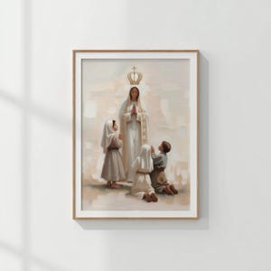 May include: A framed print depicts a religious scene. A woman in a white robe and crown stands with hands clasped, surrounded by three children in prayer. The artwork has a soft, muted color palette with a focus on light and shadow.
