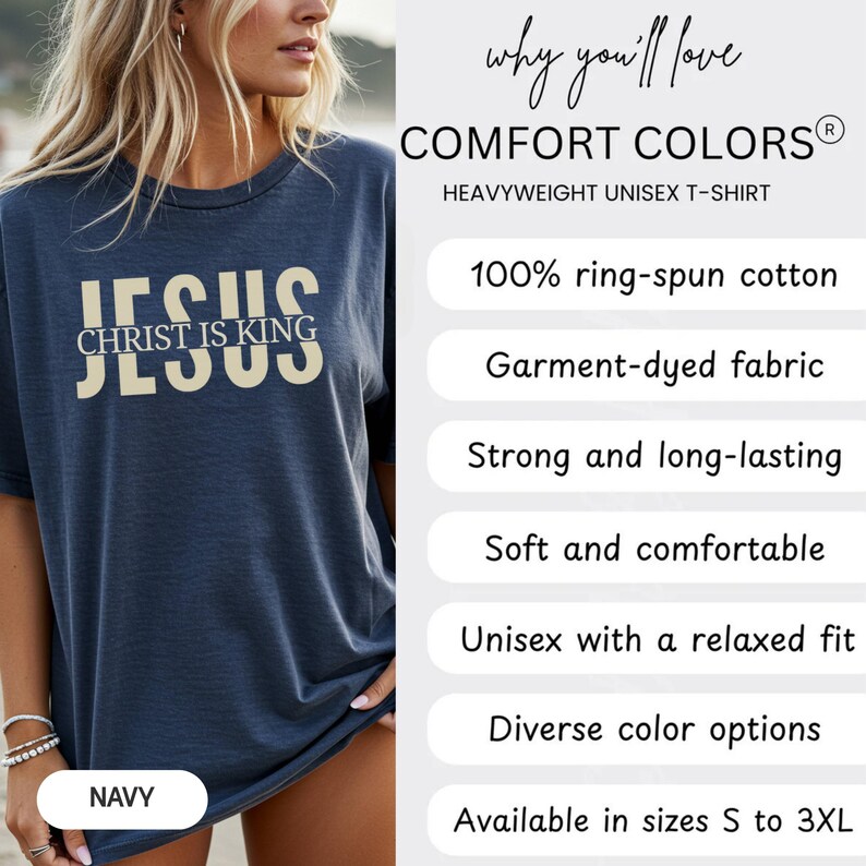 The image is a promotional image for a navy blue t-shirt with the text "JESUS" printed on it. The t-shirt is described as a "HEAVYWEIGHT UNIEX T-SHIRT" and is available in sizes S to 3XL. The image also highlights the t-shirt's features, such as 100% ring-spun cotton, 100% ring-spun cotton, and a relaxed fit.