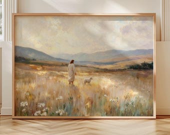 Könnte beinhalten: Ein gerahmtes Landschaftsgemälde, das eine Gestalt in einem langen Gewand zeigt, die durch ein goldenes Weizenfeld mit einem kleinen weißen Lamm geht. Die Szene zeigt sanfte Hügel unter einem bewölkten Himmel mit weichem Licht.