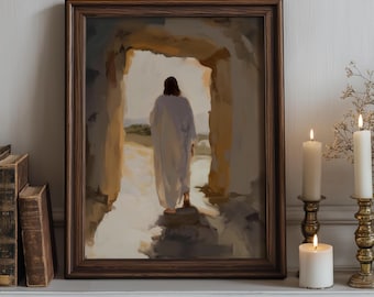 Può includere: Un dipinto incorniciato raffigura una figura in una veste bianca che cammina verso la luce. L'opera d'arte è in una cornice di legno scuro, esposta su un caminetto bianco. Candele accese in portacandele di ottone affiancano il dipinto, con vecchi libri a sinistra.