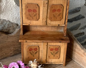 Small dresser decorated with cherries in handcrafted wood, old child's toy, doll toy, wooden child's dresser doll toy