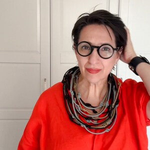 Zwart gevlochten touw: statement sieraden met meerdere strengen