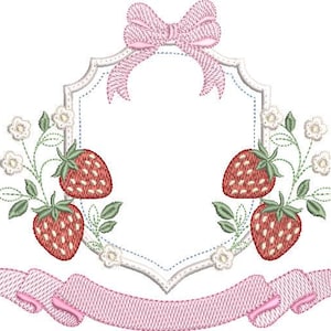 May include: Embroidered design featuring a pink bow at the top, a decorative frame, and a pink ribbon at the bottom. The frame is adorned with four red strawberries and white flowers with green leaves. The design is on a white background.