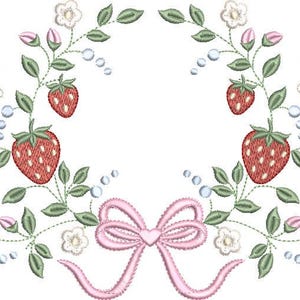 May include: Embroidered design featuring a wreath of strawberries, leaves, and flowers. Two pink butterflies and a pink bow are also included in the design. The strawberries are red with white seeds. The design is on a white background.
