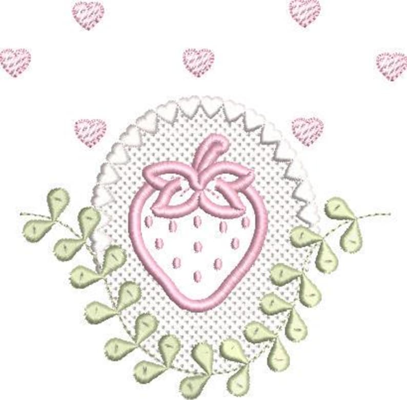 May include: Embroidered design featuring a pink strawberry with a green stem and seeds, surrounded by a white lace-like border and green leaves. Pink heart accents are scattered on a white background. The design is likely for embroidery or applique.