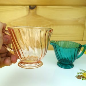 2 Jeannette Swirl Pieces; Ultramarine Creamer and Pink Coffee Cup, 1930s