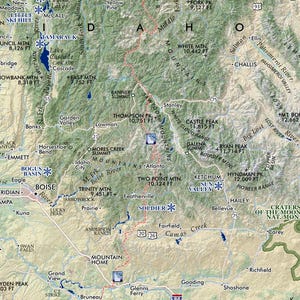 May include: A detailed map of Idaho, USA, featuring mountain ranges, rivers, and towns. Key locations like Boise, McCall, and Sun Valley are labeled. The map includes elevation markers in feet and road numbers.