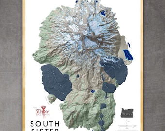 May include: A topographic map of South Sister, a mountain in Oregon. The map shows the mountain's elevation, trails, and other features. The map is printed on white paper and framed in a light wood frame.