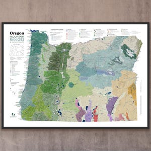May include: A framed wall map titled Oregon Mountain Ranges & High Points, featuring a detailed topographical representation of Oregon with various colored regions, elevation markers, a legend, and a small inset map of the state's counties.