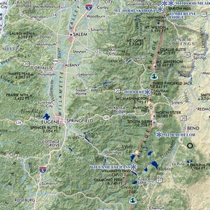 May include: A detailed map of a mountainous region, featuring cities like Salem, Eugene, and Bend. The map highlights mountain peaks, lakes, rivers, and major highways, with elevation markers in feet.