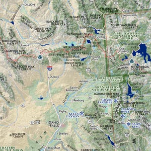 May include: A detailed map of Yellowstone National Park and surrounding areas, including Idaho Falls and Grand Teton National Park. Features include mountain ranges, lakes, rivers, and labeled towns. The map uses a neutral color palette.