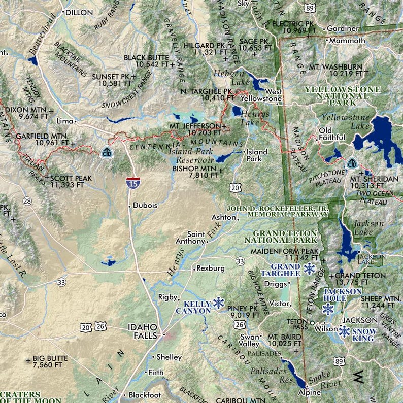May include: A detailed map of Yellowstone National Park and surrounding areas, including Idaho Falls and Grand Teton National Park. Features include mountain ranges, lakes, rivers, and labeled towns. The map uses a neutral color palette.