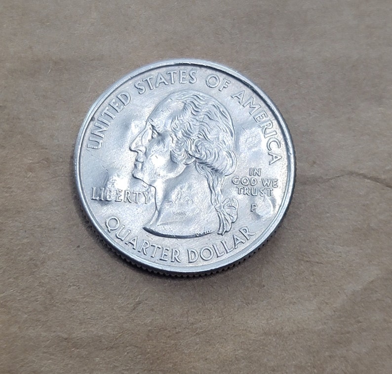 West Virginia State Quarter With trump 2024 Stamped on It. West
