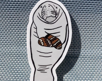 Niedliche Manatee mit Fäustlingen Vinyl Sticker - Wetterfest, Hochwertig, Langlebig