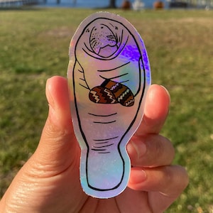 Wunderschöner Holographic Manatee mit Bernie Fäustlinge Sticker - wetterfest, hochwertig, langlebig!
