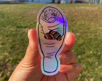 Wunderschöner Holographic Manatee mit Bernie Fäustlinge Sticker - wetterfest, hochwertig, langlebig!