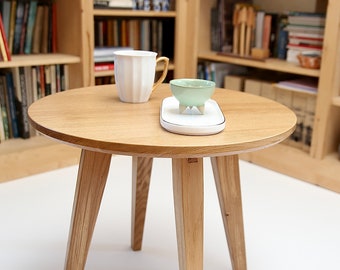 Solid oak coffee table, hand-made, with dovetail joined legs.