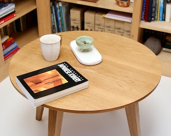 Solid oak coffee table, hand-made, with dovetail joined legs.