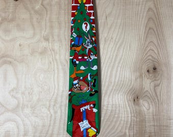 Corbata vintage de los 90 con estampado de regalos navideños de Looney Tunes.