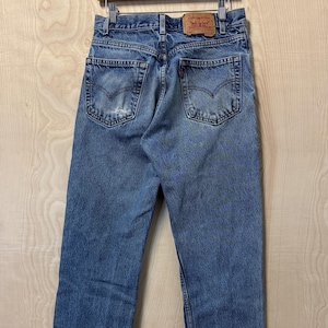 Vintage 90s Levis 505 Regular Fit Straight Leg Medium Wash Denim Distressed Blue Jean size 32 x 34
