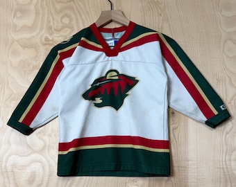 Camiseta de hockey vintage Minnesota Wild CCM Air Knit de poliéster blanco, talla única para niño.