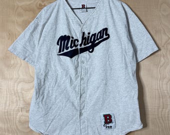 Camiseta de béisbol vintage de los años 90 de la Universidad de Michigan, de algodón gris, con botones cosidos, talla grande.