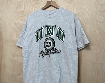 Vintage des années 90 University of North Dakota combats Sioux Crest gris t-shirt taille XL