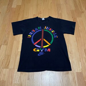 Vintage 90s Nike Urban Jungle Gym Peace Logo Spike Lee Black Cotton T Shirt size Large Made in USA