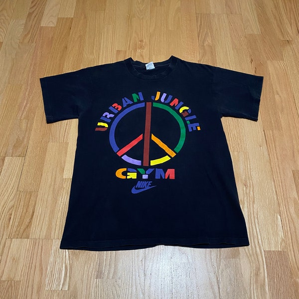 Vintage 90s Nike Urban Jungle Gym Peace Logo Single Stitch Black Cotton Short Sleeve T Shirt size Large Made in USA