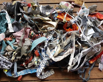 Mostly cotton fabric remnants scraps strips material textile art #zerowaste upcycled recycled sustainable craft collage sewing offcut strips