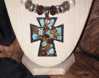 Beaded cross in turquoise and brown looking stones