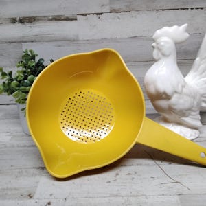 May include: A rustic wooden sign with the text "Welcome to our home" in a handwritten style. The sign features a distressed finish and a simple, inviting design, perfect for a front porch or entryway.