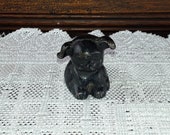 Bucki Carbons Ribbons Griswold Cast Iron Promo Pup, advertising