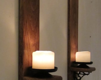 Pair of rustic reclaimed wood wall sconce candle holders with beautiful cast iron bracket decoration