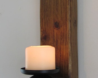 Large chunky reclaimed plank wood wall sconce candle holder with beautiful cast iron decoration