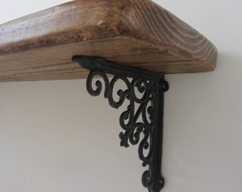Rustic Farmhouse style reclaimed plank wood shelf with solid cast iron brackets