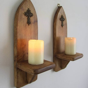Pair of Church / Gothic style wall sconce led candle holders with Antique bronze cross / crucifix decoration , various sizes available