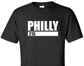 May include: Black t-shirt with white text that reads "PHILLY 215"