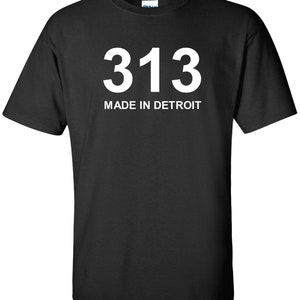 May include: Black t-shirt with white text that reads "313 MADE IN DETROIT".