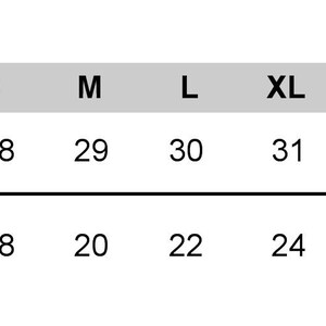 May include: Size chart showing body length and width measurements in inches for sizes S, M, L, XL, and 2XL.