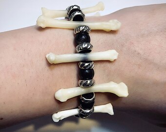 Raccoon foot bone and silver obsidian beaded bracelet