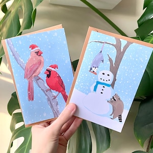 Cartes de voeux de Noël | Cartes hivernales, oiseaux, créatures des bois, cartes de Noël, cardinaux, raton laveur, opossum