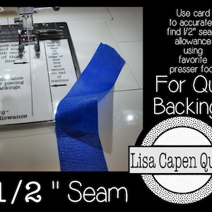 May include: A close-up of a sewing machine with a blue tape measure and a white card that reads "1/2" Seam Allowance used for piecing quilt backings." The card is labeled "Move needle and align with centre of this line" and "Lane up edge of tape to left edge of this line and secure on bed of machine". The text "Use card to accurately find 1/2" seam allowance using favourite presser foot For Quilt Backings!" is visible in the background. The text "Lisa Capen Quilts" is also visible in the background.