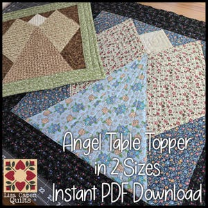 May include: A digital download pattern for an Angel Table Topper in two sizes. The pattern features a quilted design with a floral fabric in shades of blue, pink, and green. The text "Angel Table Topper in 2 Sizes Instant PDF Download" is displayed on the image.